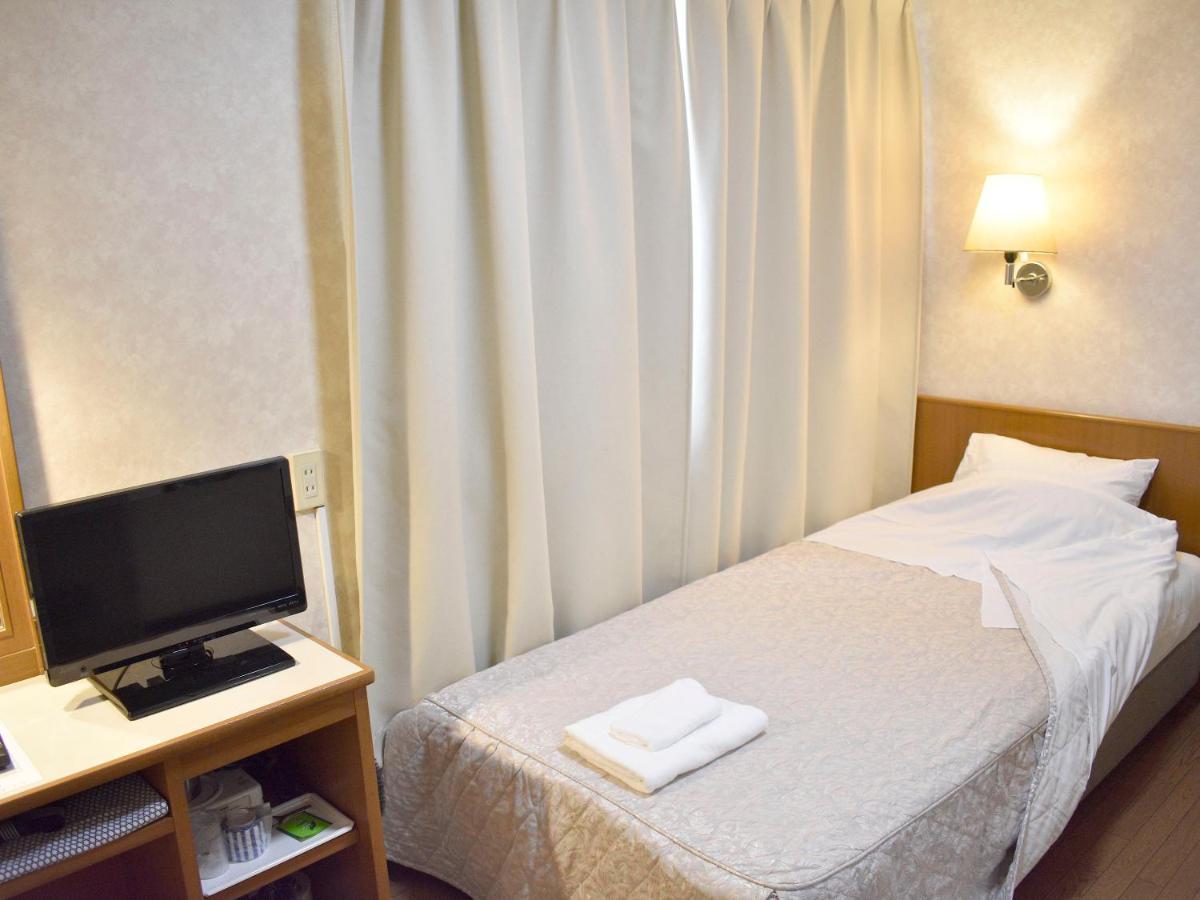 Business Ryokan Harada Hotel Hiroshima Bagian luar foto